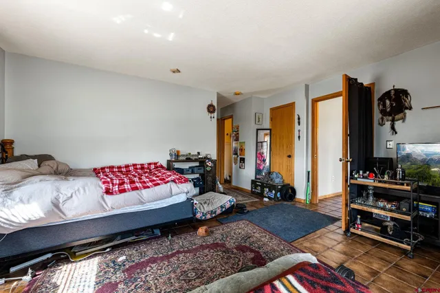 a bedroom with furniture and a couch