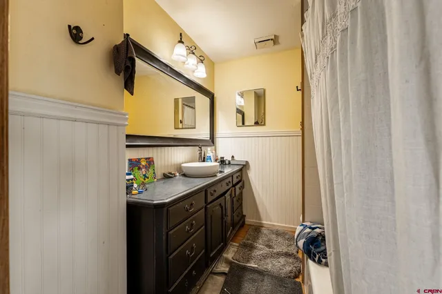 a utility room with a sink a washer and dryer