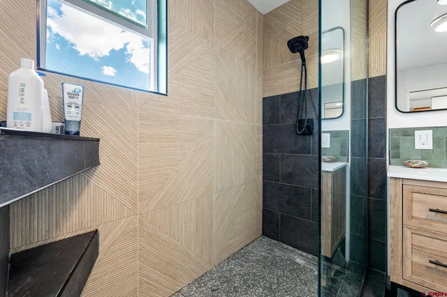 a bathroom with a mirror