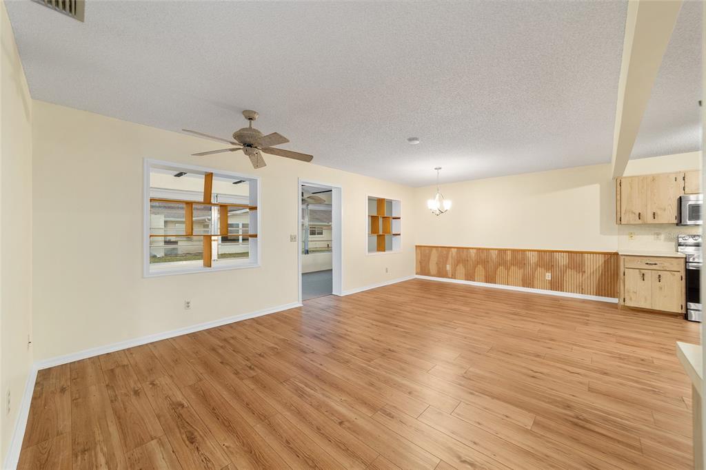8890 Southwest 96th Street, Unit B Ocala, FL 34481 - Photo 11 of 42 a view of an empty room with a window
