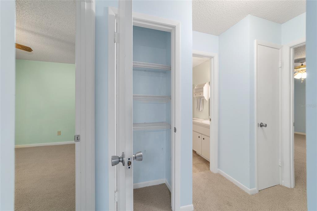 8890 Southwest 96th Street, Unit B Ocala, FL 34481 - Photo 21 of 42 a view of a bathroom from a hallway