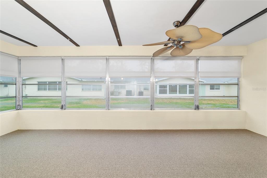 8890 Southwest 96th Street, Unit B Ocala, FL 34481 - Photo 30 of 42 a view of an empty room with a window