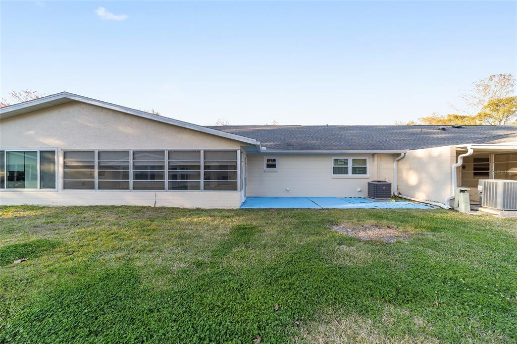 8890 Southwest 96th Street, Unit B Ocala, FL 34481 - Photo 40 of 42 a house view with a garden space