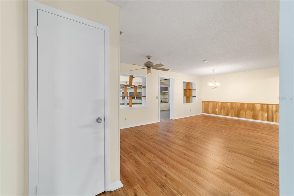 8890 Southwest 96th Street, Unit B Ocala, FL 34481 - Photo 10 of 42 a view of a kitchen with wooden floor