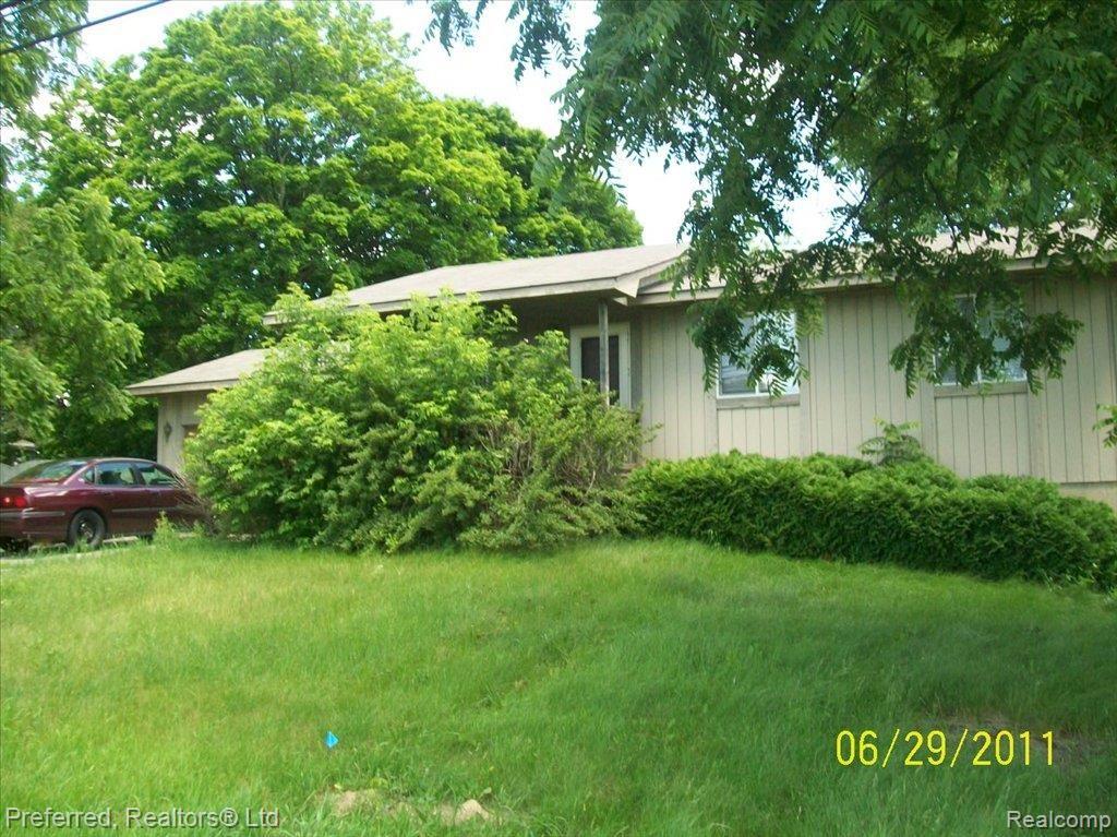 648 Decker Road Walled Lake, MI 48390 - Photo 1 of 22 Front