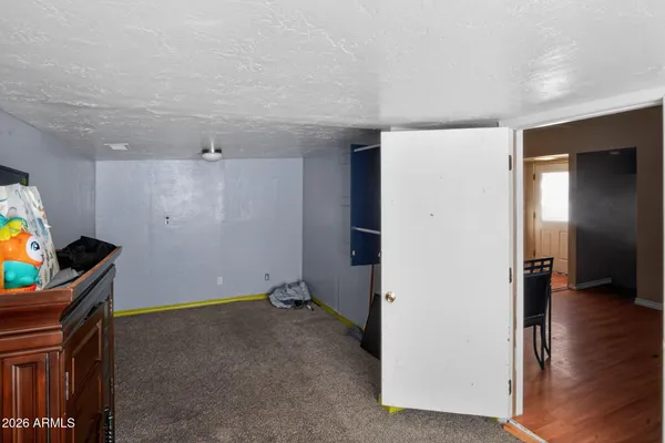 a play room with furniture and a window