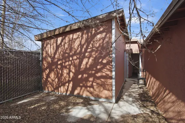 a view of a yard covered with snow in the background