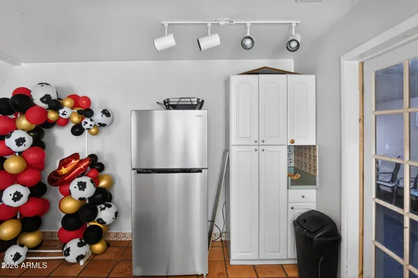 a living room with fireplace furniture and a wooden floor