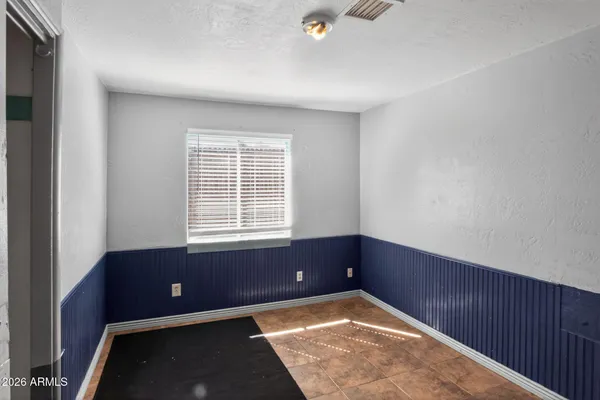 a white refrigerator freezer sitting inside of a kitchen