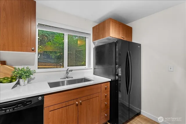 $319,000 | 14206 Northeast 181st Place, Unit L102, Woodinville, WA 98072