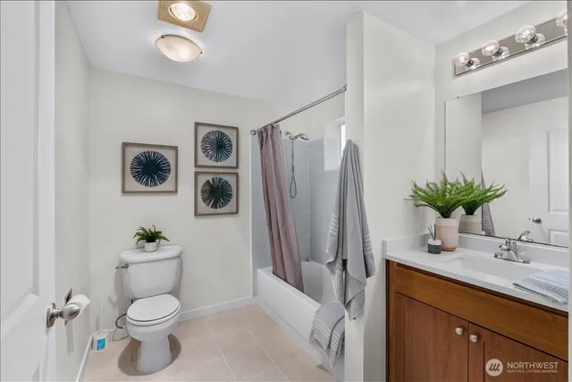 $319,000 | 14206 Northeast 181st Place, Unit L102, Woodinville, WA 98072