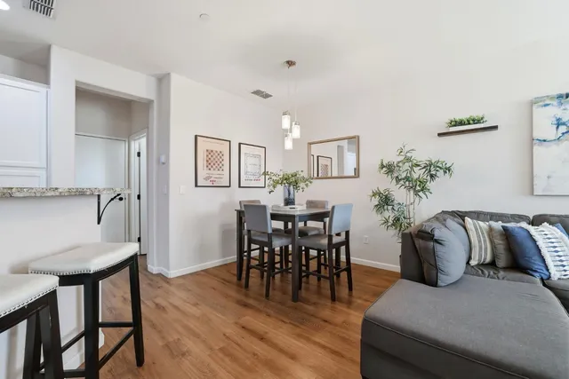 a view of a livingroom and dining room