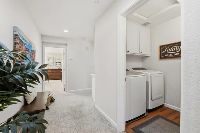 an aerial view of a house with a garden