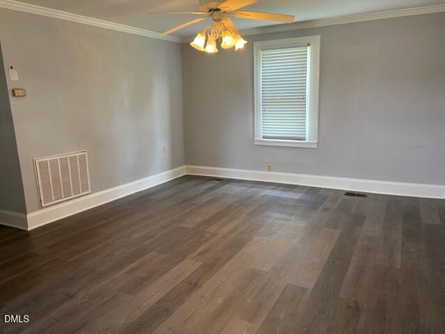 3831 Bizzell Grove Church Road Princeton, NC 27569 - Photo 15 of 17 a view of an empty room with wooden floor and a window
