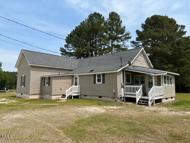 3831 Bizzell Grove Church Road Princeton, NC 27569 - Photo 3 of 17 a view of a house with backyard