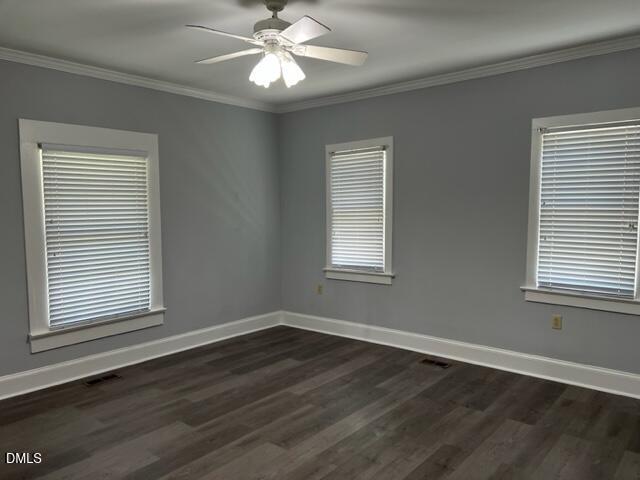3831 Bizzell Grove Church Road Princeton, NC 27569 - Photo 5 of 17 a view of an empty room with wooden floor and a window