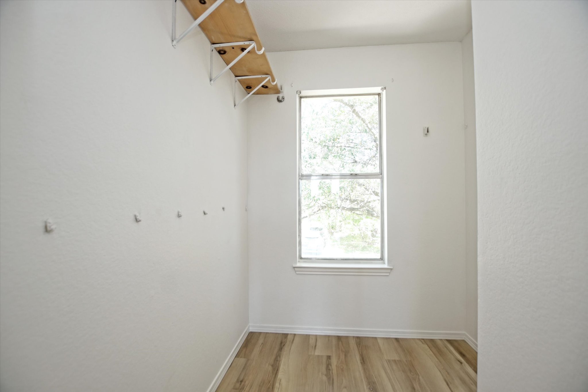 2509 Patsy Parkway Austin, TX 78744 - Photo 15 of 28 an empty room with a window