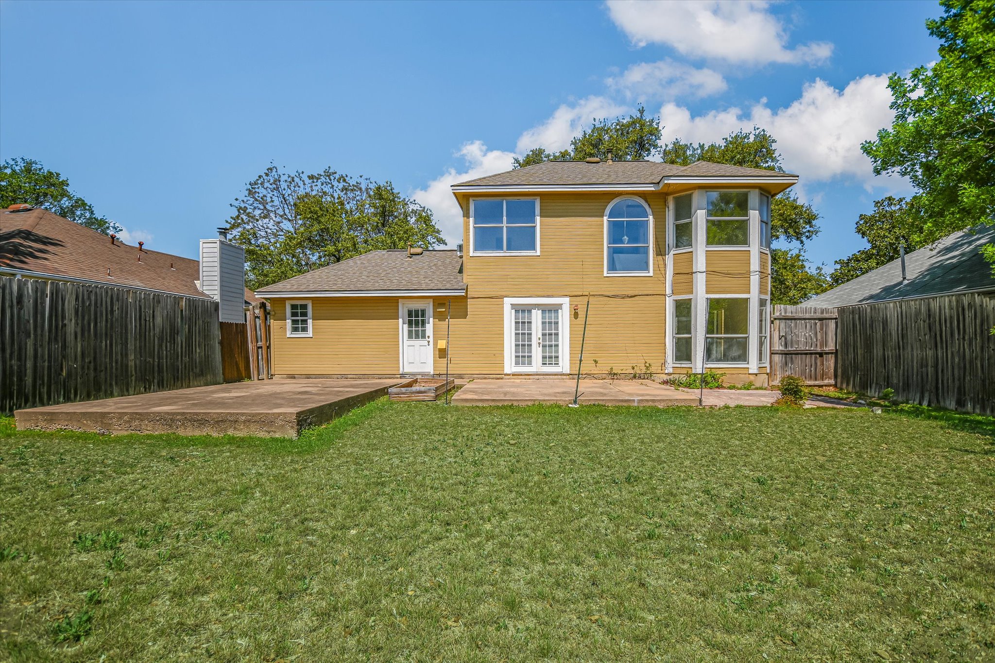 2509 Patsy Parkway Austin, TX 78744 - Photo 21 of 28 a front view of a house with a yard
