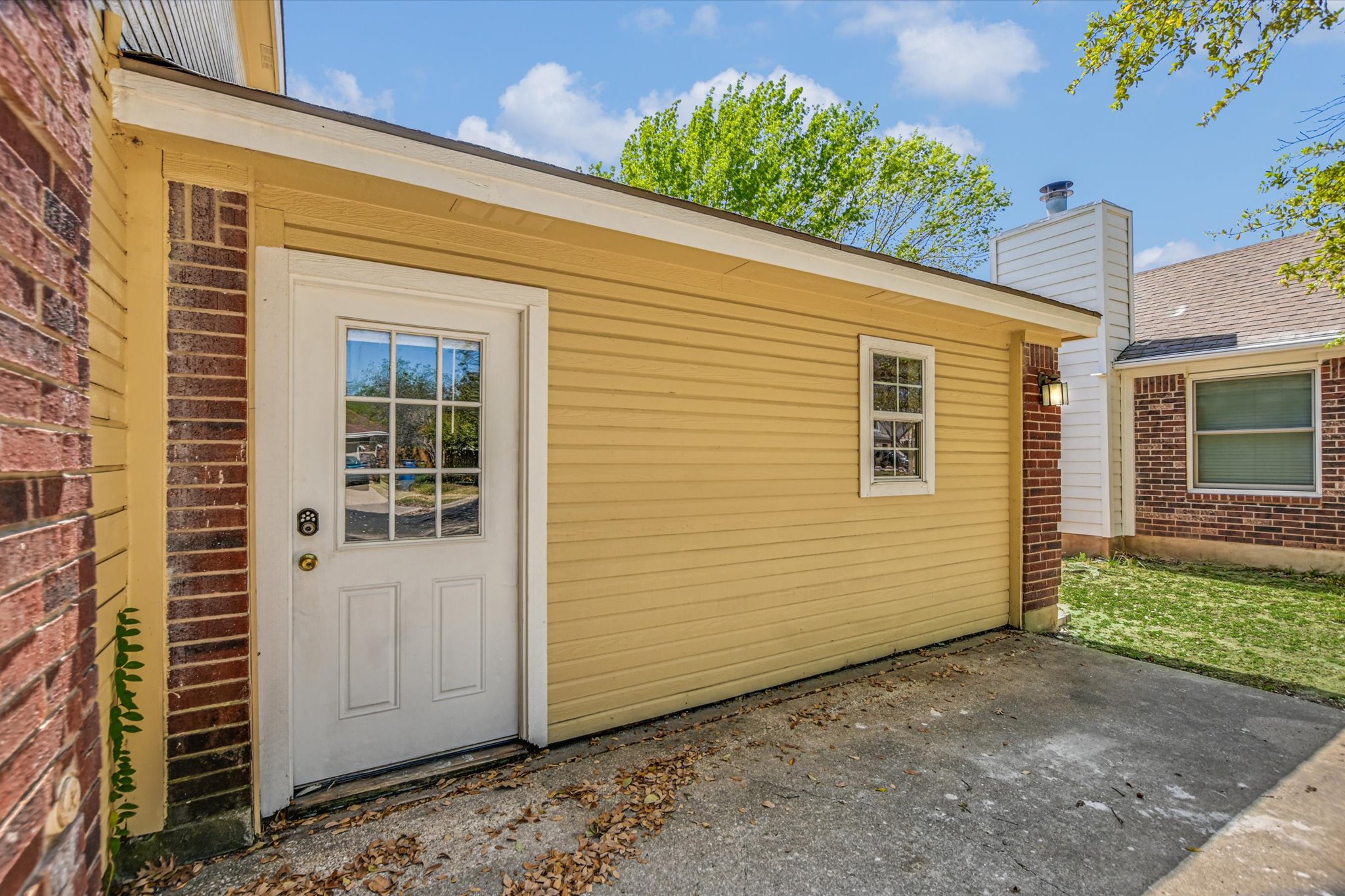 2509 Patsy Parkway Austin, TX 78744 - Photo 4 of 28 a view of a house with potted plants