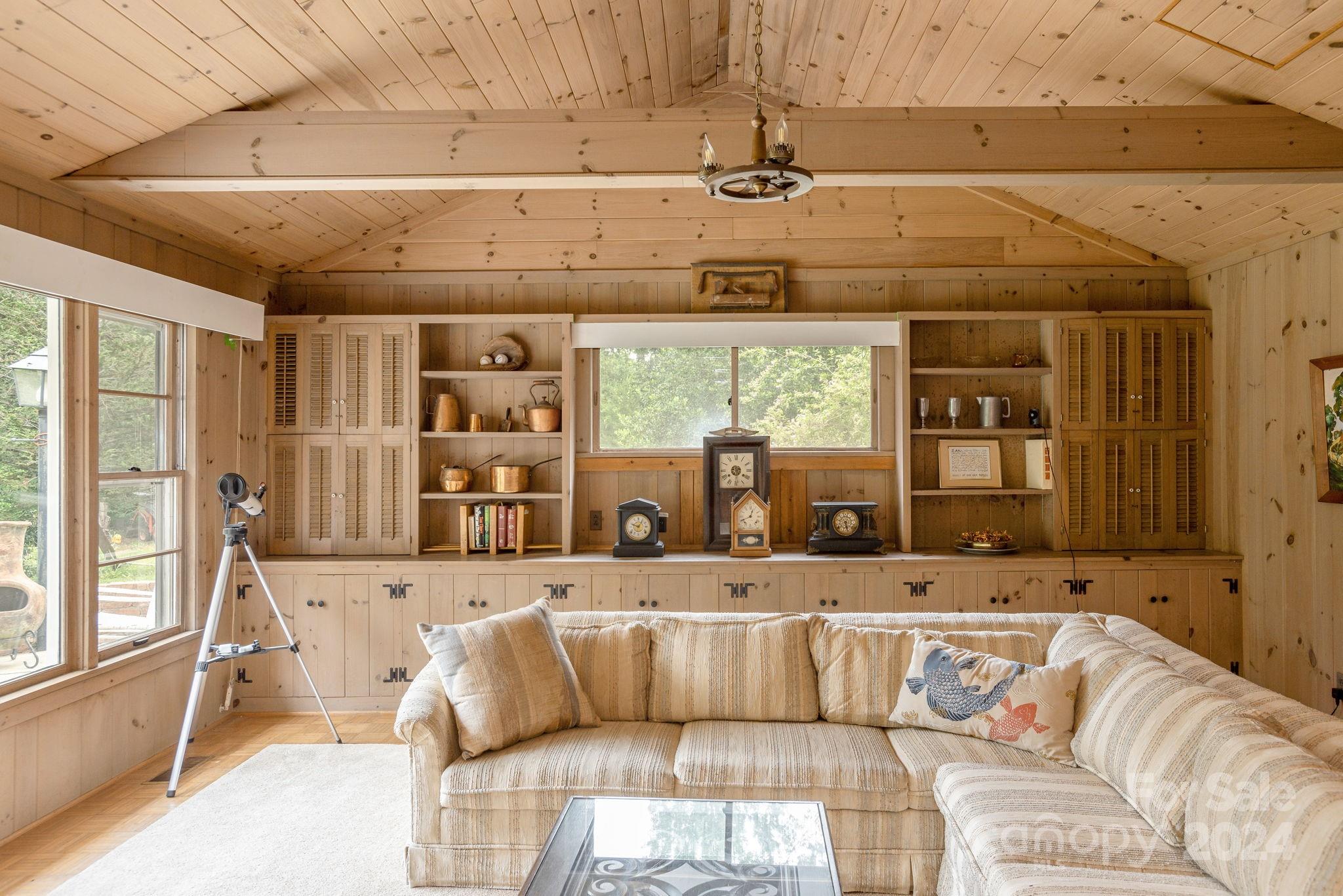 1489 Lynn Road Tryon, NC 28782 - Photo 7 of 46 a living room with a couch and a large window