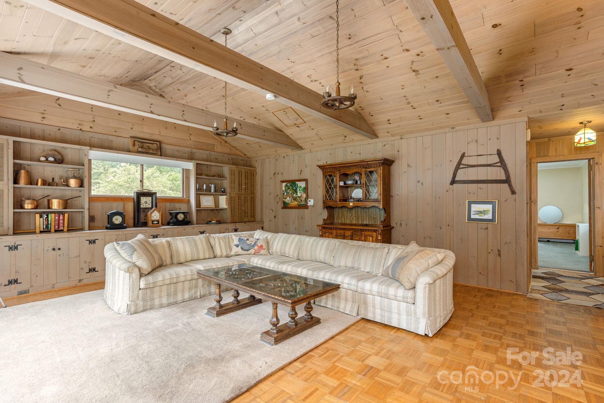 1489 Lynn Road Tryon, NC 28782 - Photo 8 of 46 a living room with furniture and a couch