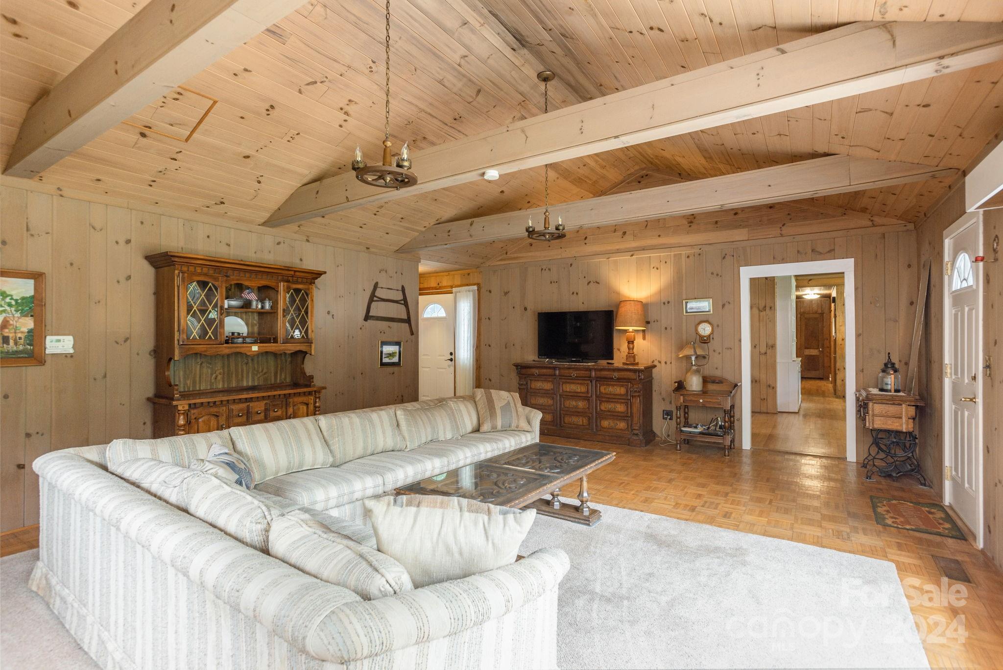 1489 Lynn Road Tryon, NC 28782 - Photo 9 of 46 a living room with furniture and wooden floor