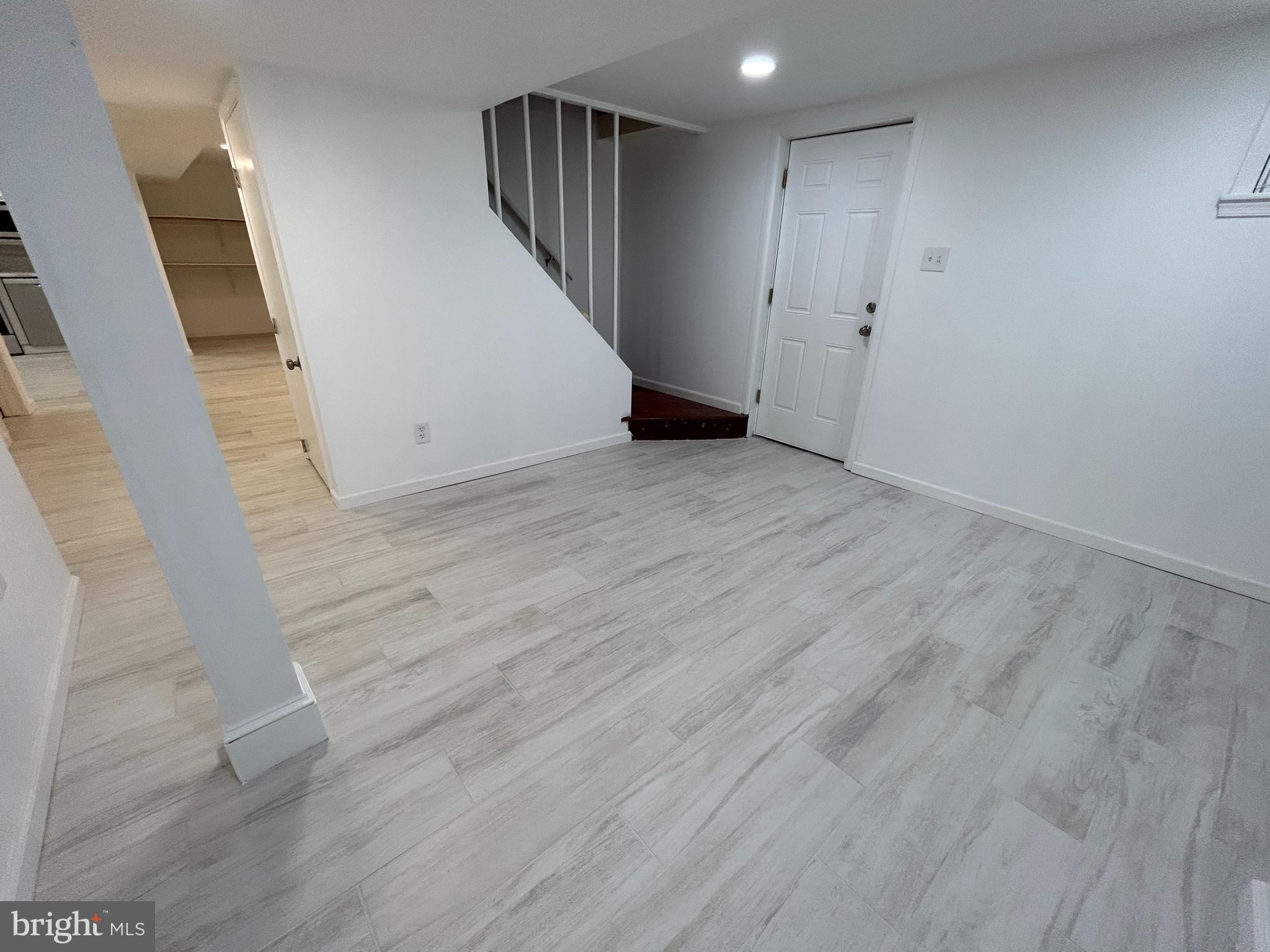 7131 Gormel Drive Springfield, VA 22150 - Photo 13 of 27 a view of hallway with wooden floor