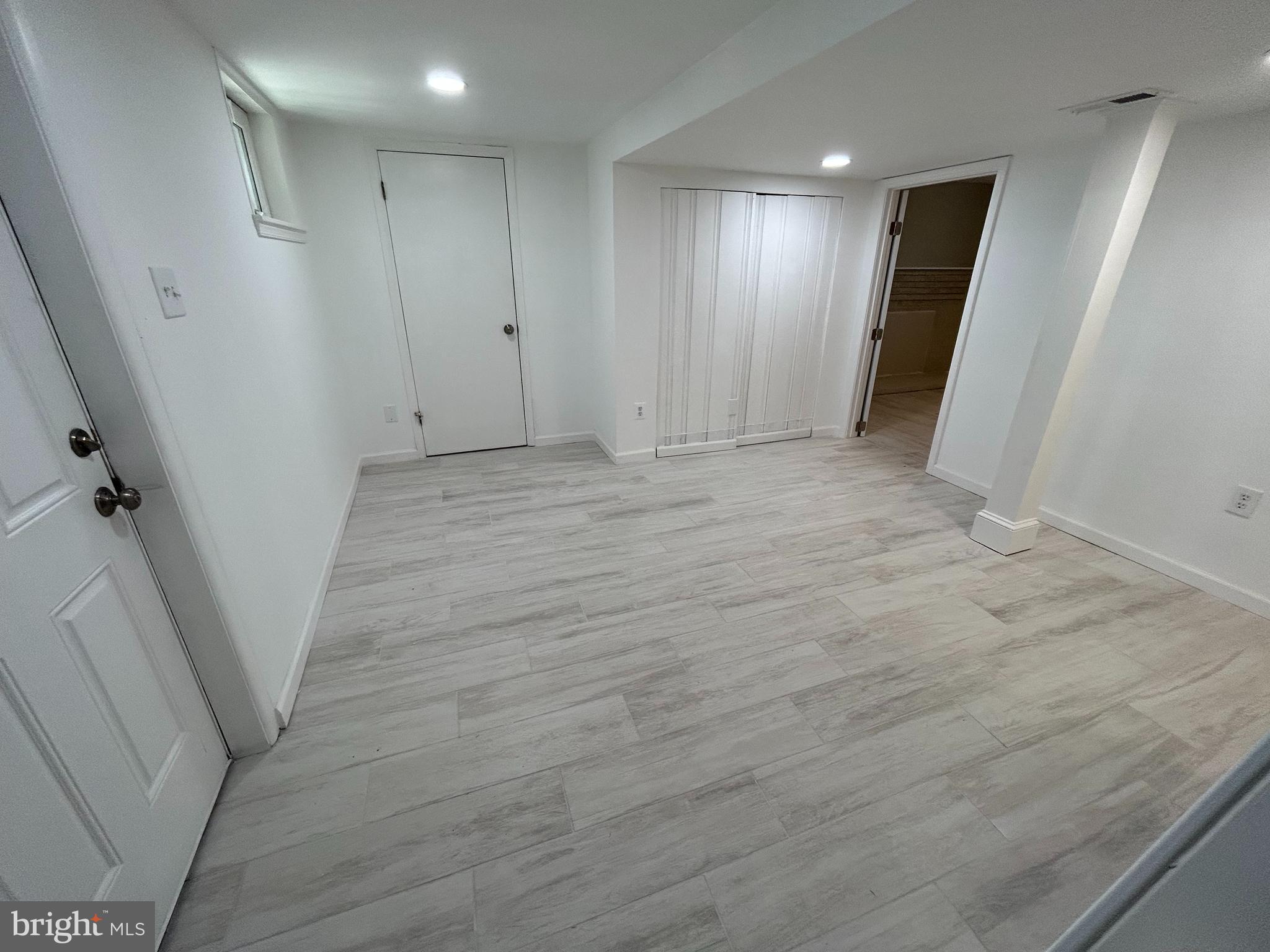 7131 Gormel Drive Springfield, VA 22150 - Photo 16 of 27 a view of hallway with wooden floor