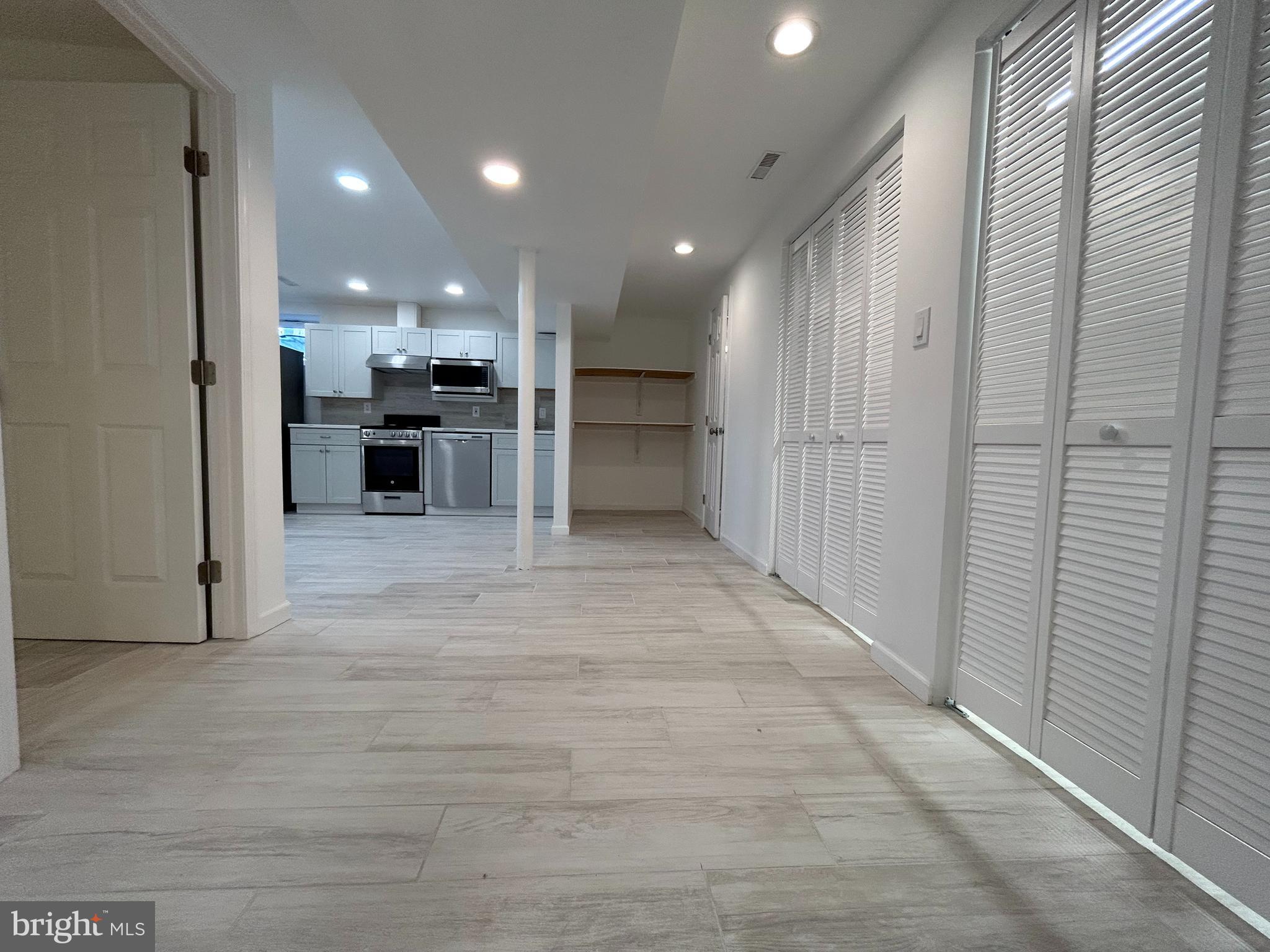 7131 Gormel Drive Springfield, VA 22150 - Photo 19 of 27 a view of a kitchen with a sink and refrigerator