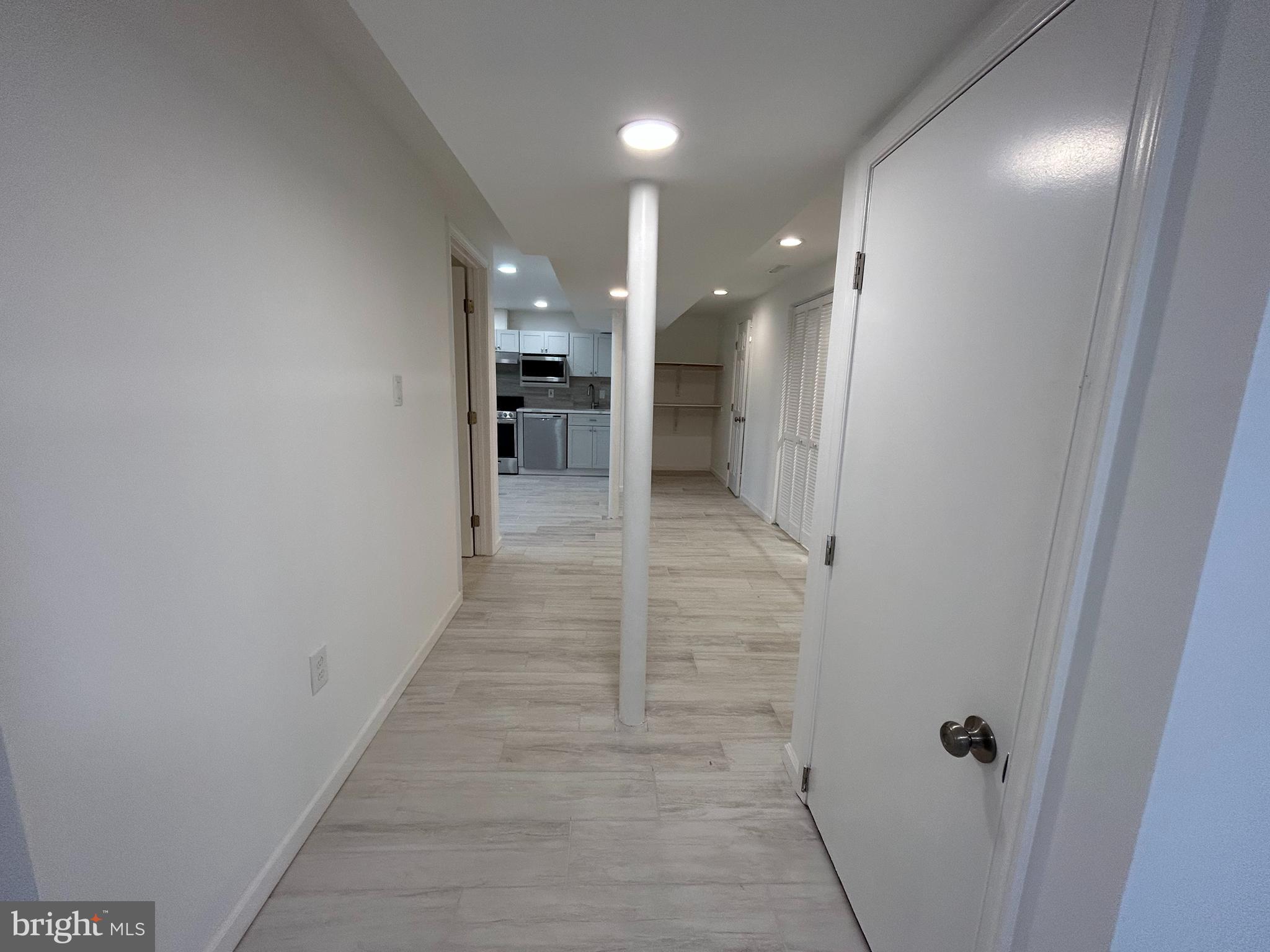 7131 Gormel Drive Springfield, VA 22150 - Photo 22 of 27 a bathroom with a glass shower door