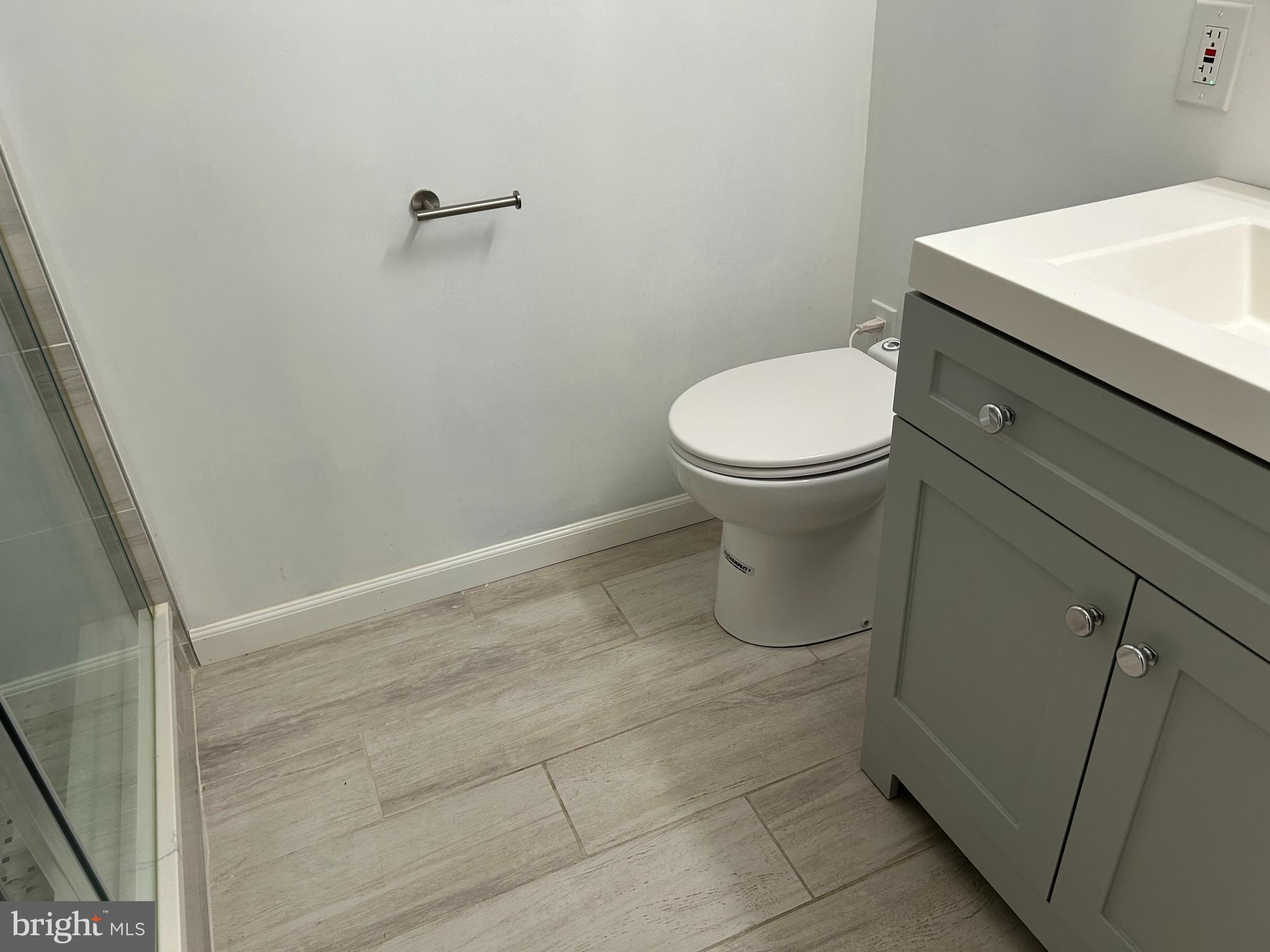 7131 Gormel Drive Springfield, VA 22150 - Photo 25 of 27 a bathroom with a toilet and a sink