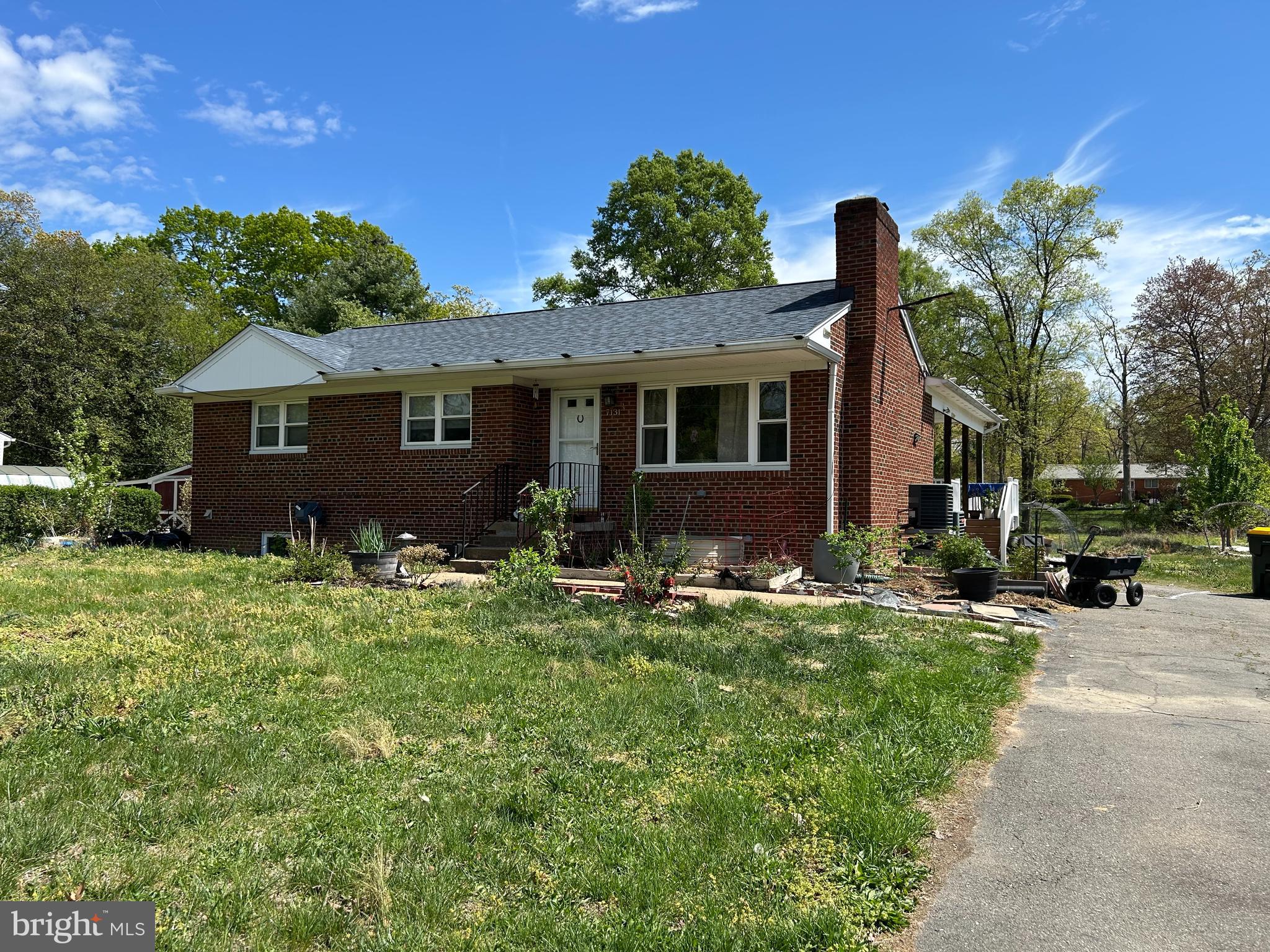 7131 Gormel Drive Springfield, VA 22150 - Photo 27 of 27 a backyard of a house with table and chairs