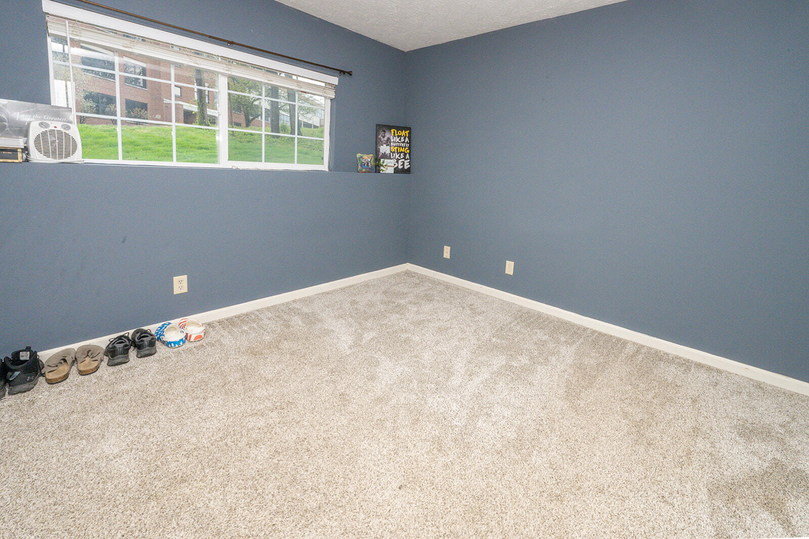 29 School Road Walton, KY 41094 - Photo 18 of 30 Light gray carpeting with white baseboards and blue-painted walls