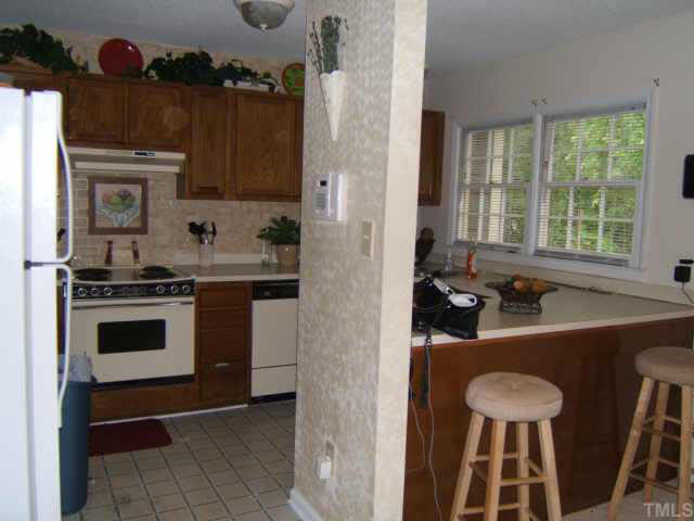 1712 Maybrook Drive Raleigh, NC 27610 - Photo 3 of 10 Kitchen/breakfast bar