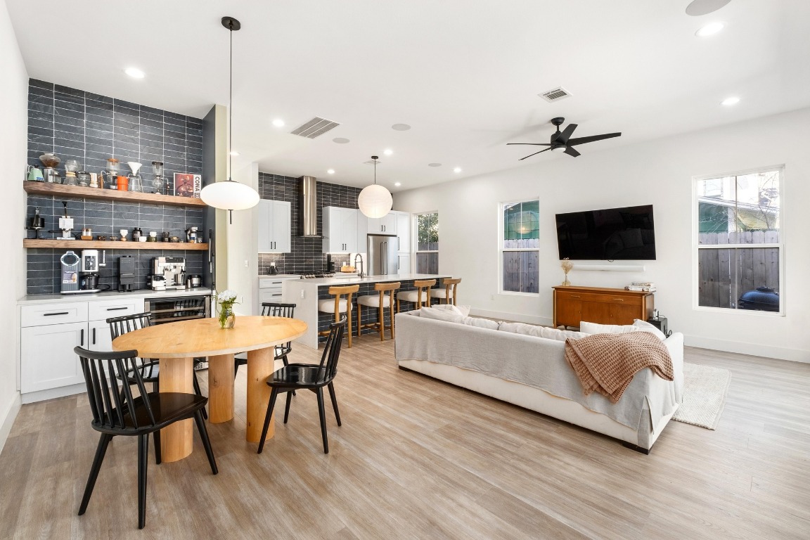 3302 Thompson Street, Unit 1 Austin, TX 78702 - Photo 11 of 32 a living room with stainless steel appliances furniture and a flat screen tv
