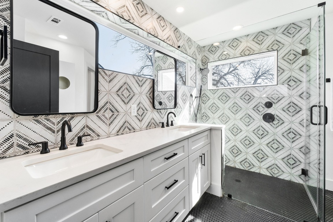 3302 Thompson Street, Unit 1 Austin, TX 78702 - Photo 21 of 32 a bathroom with a sink and a mirror