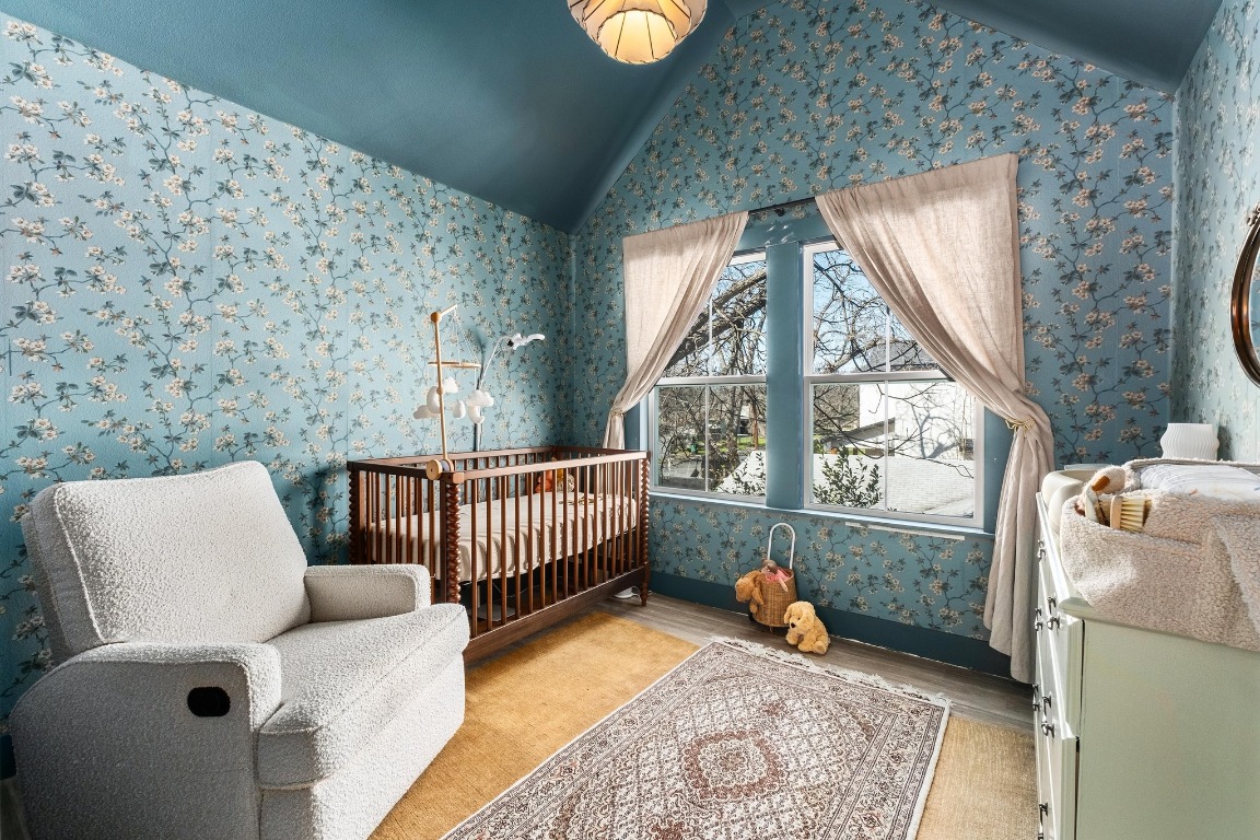 3302 Thompson Street, Unit 1 Austin, TX 78702 - Photo 24 of 32 a bedroom with furniture and a window