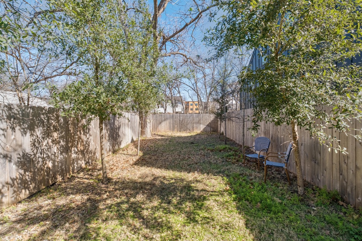 3302 Thompson Street, Unit 1 Austin, TX 78702 - Photo 29 of 32 a view of a yard with trees