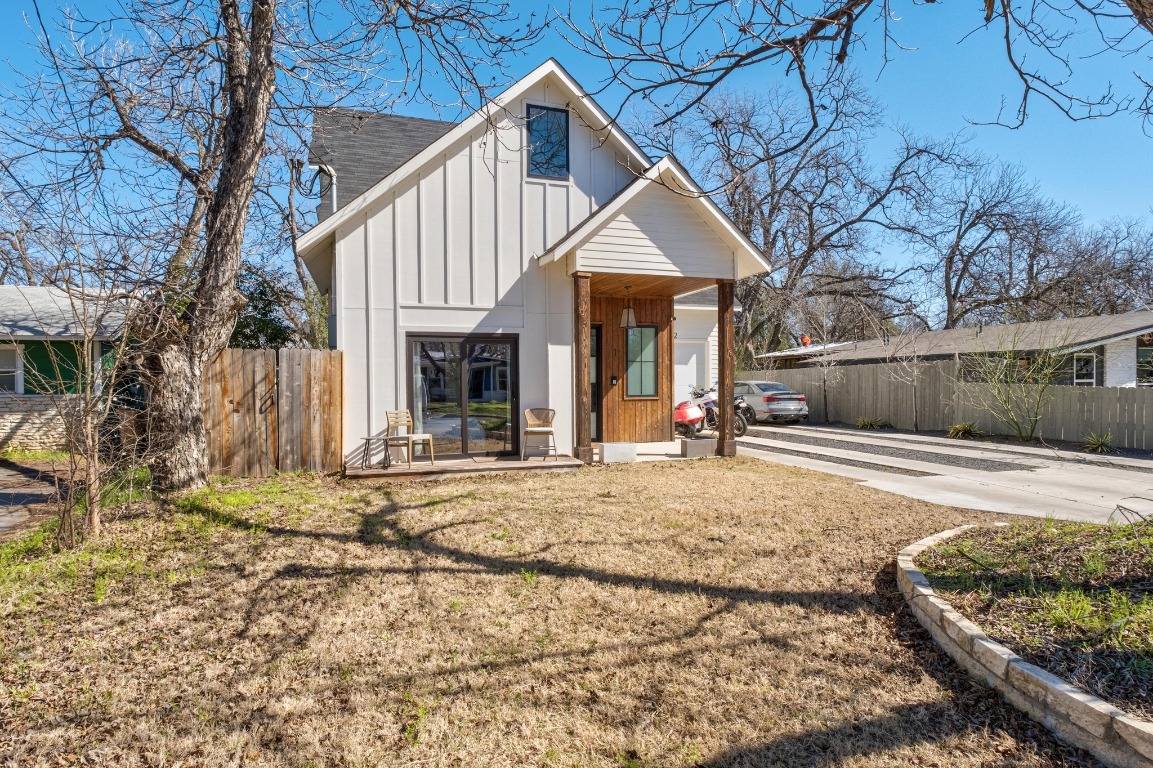 3302 Thompson Street, Unit 1 Austin, TX 78702 - Photo 3 of 32 a view of a house with snow on the side of the road