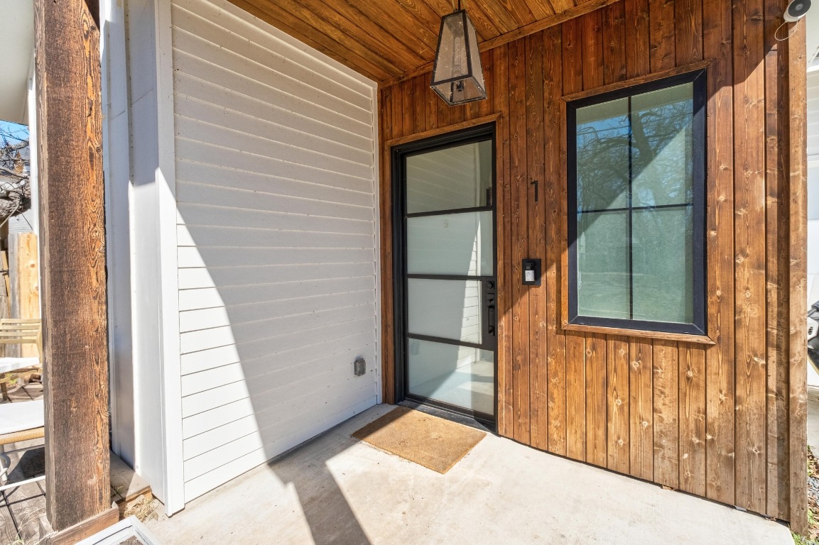 3302 Thompson Street, Unit 1 Austin, TX 78702 - Photo 4 of 32 a view of a balcony with door