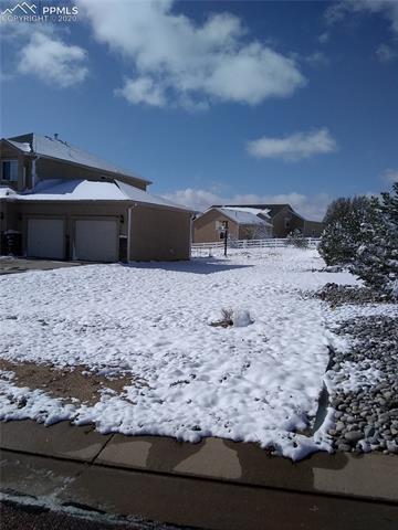 9275 Rockingham Drive Peyton, CO 80831 - Photo 24 of 26 Large area for RV Parking next to Garage.