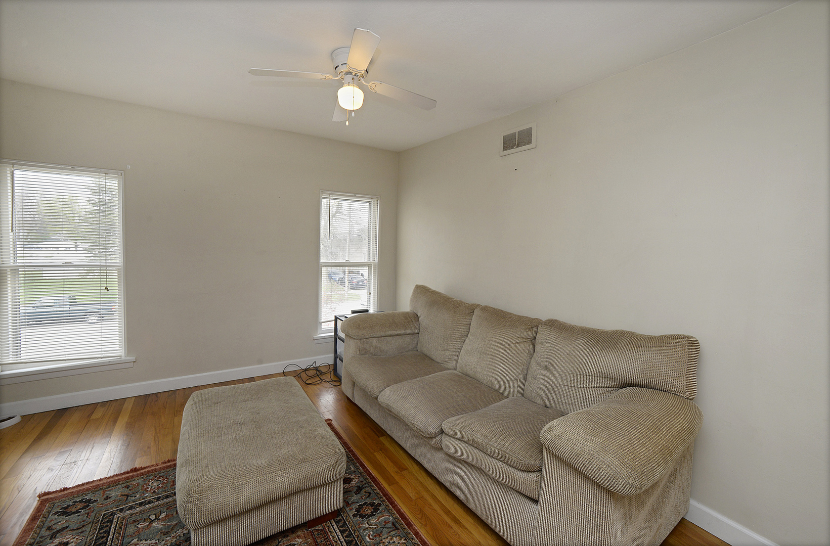 613 Webster Street Ottawa, IL 61350 - Photo 7 of 15 a living room with furniture and a window