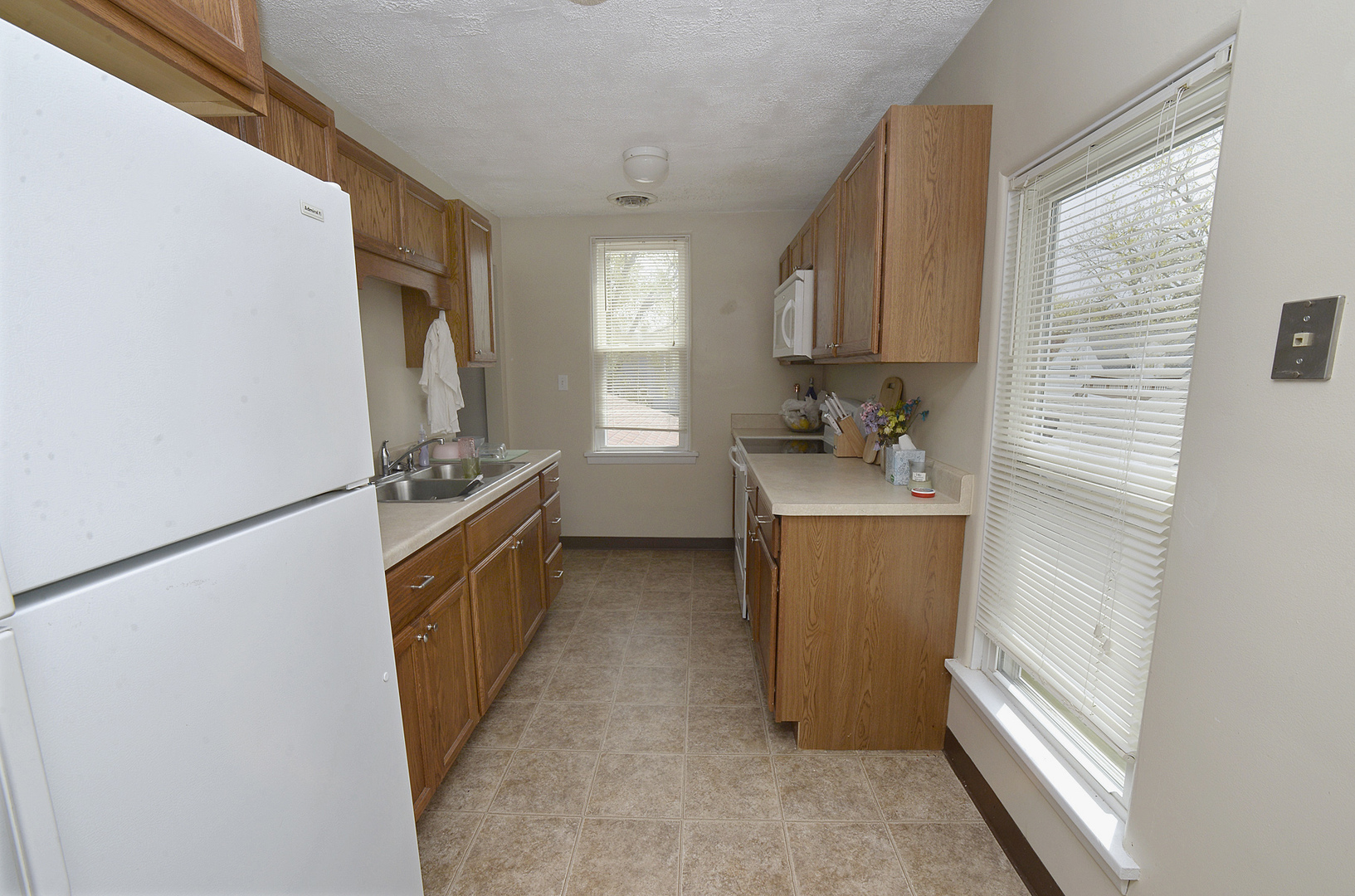 613 Webster Street Ottawa, IL 61350 - Photo 8 of 15 a bathroom with a sink a mirror and a toilet