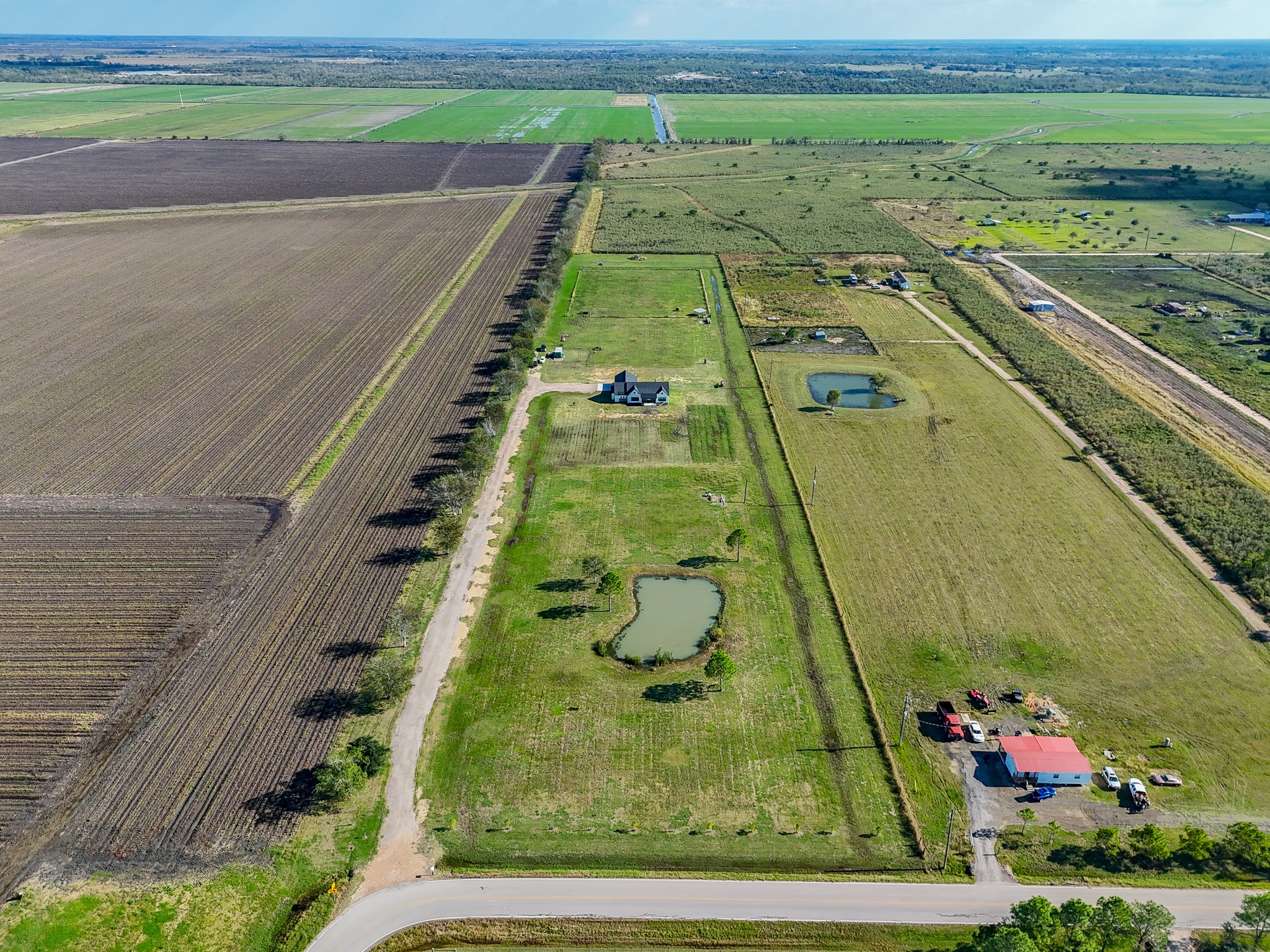 15007 Barak Road Guy, TX 77444 - Photo 32 of 34 a view of swimming pool with a garden and seating area