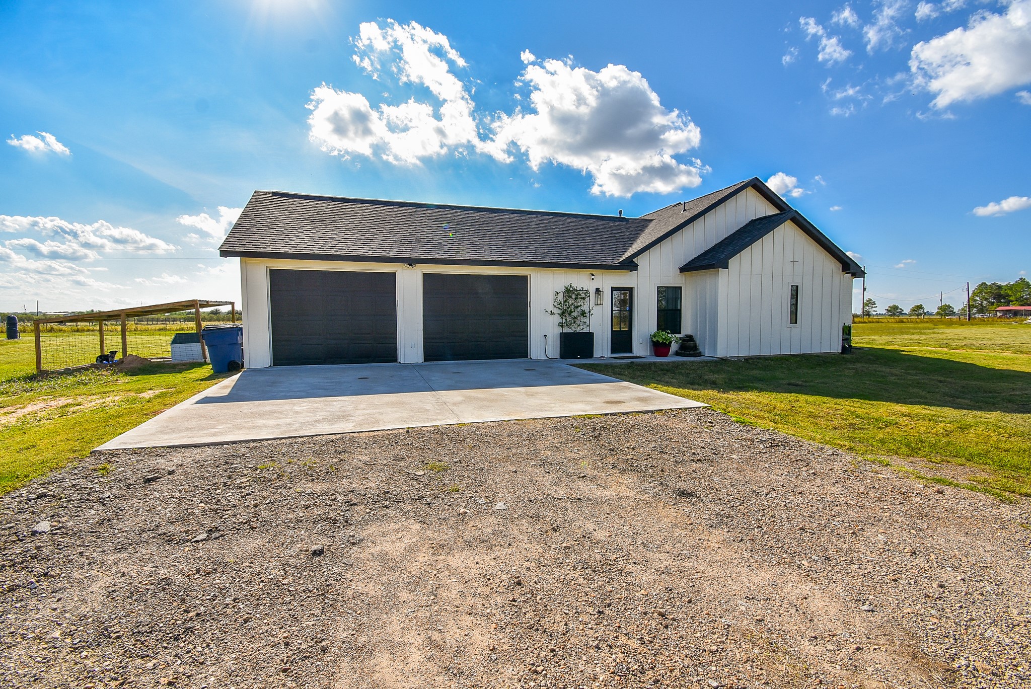 15007 Barak Road Guy, TX 77444 - Photo 4 of 34 a view of a house with a backyard and yard