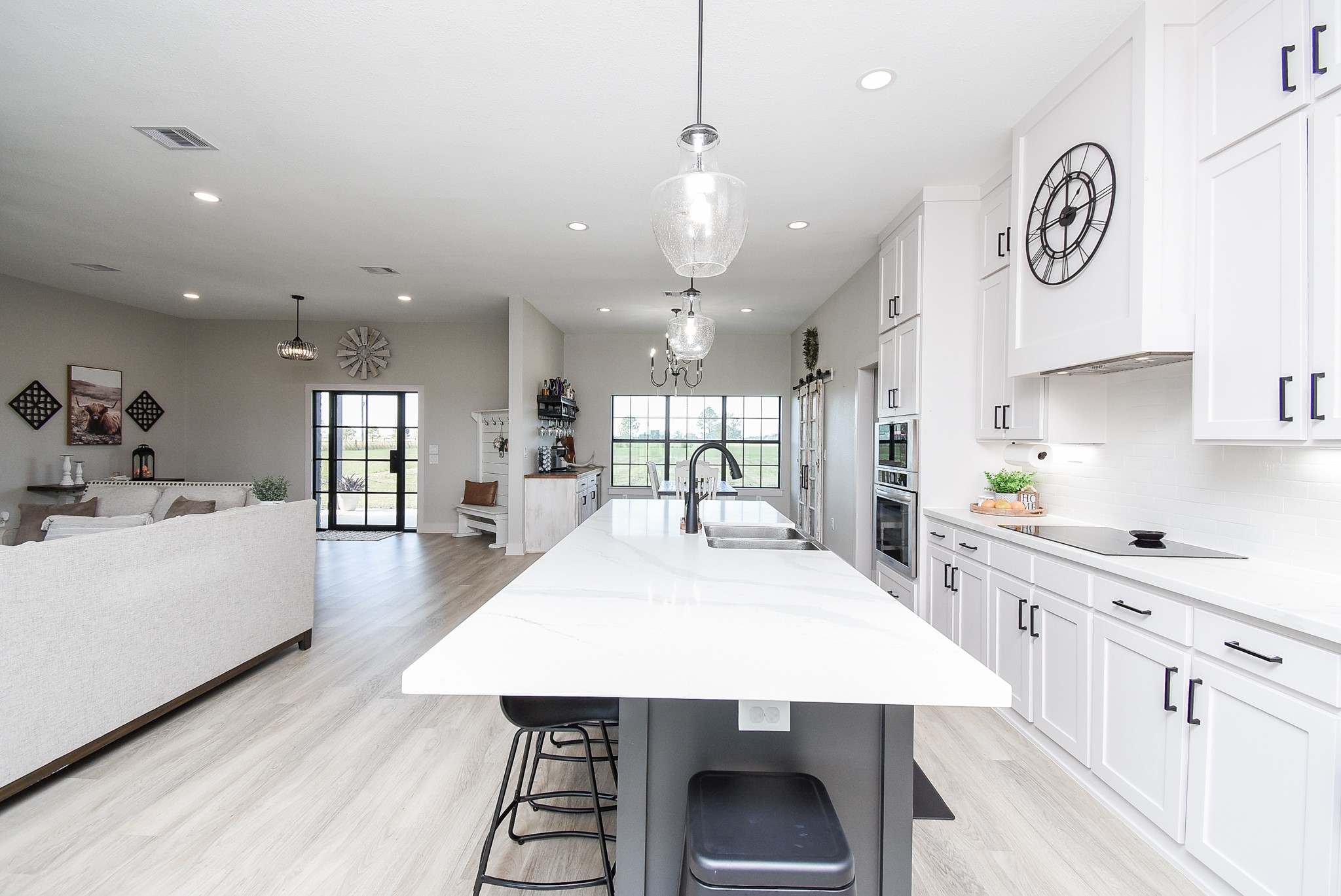15007 Barak Road Guy, TX 77444 - Photo 10 of 34 a large kitchen with kitchen island a table and chairs
