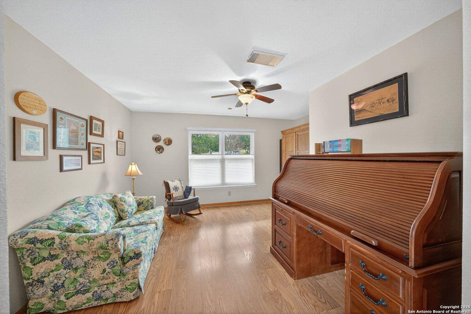 175 Forest Oaks Lane Lakehills, TX 78063 - Photo 12 of 36 a living room with furniture and a wooden floor