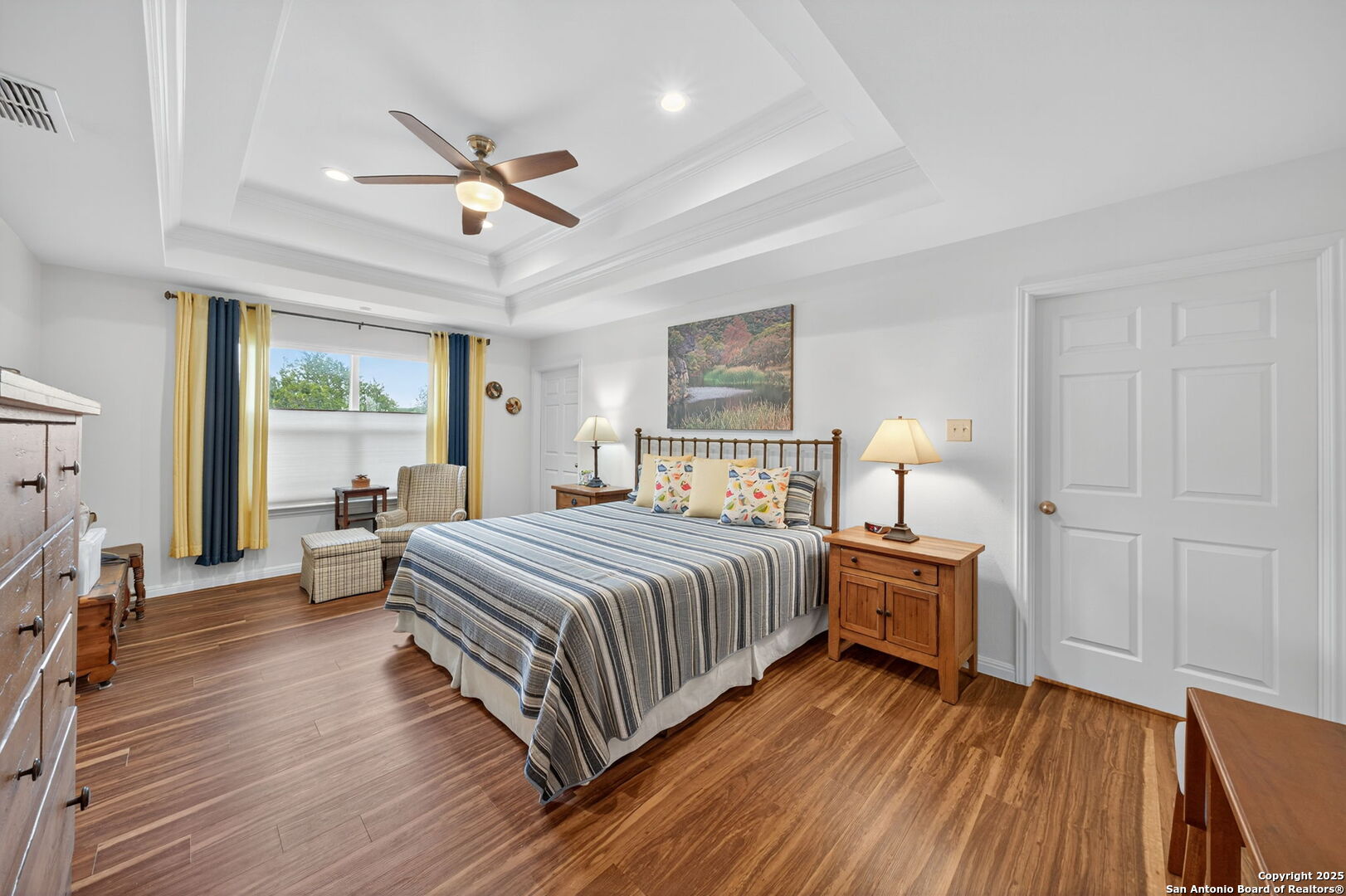 175 Forest Oaks Lane Lakehills, TX 78063 - Photo 15 of 36 a bedroom with bed and window