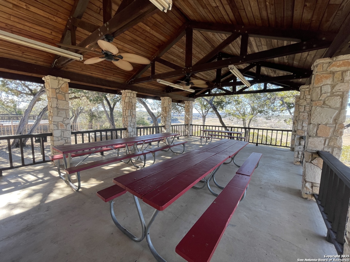 175 Forest Oaks Lane Lakehills, TX 78063 - Photo 33 of 36 a view of a chairs and table in the outdoor room