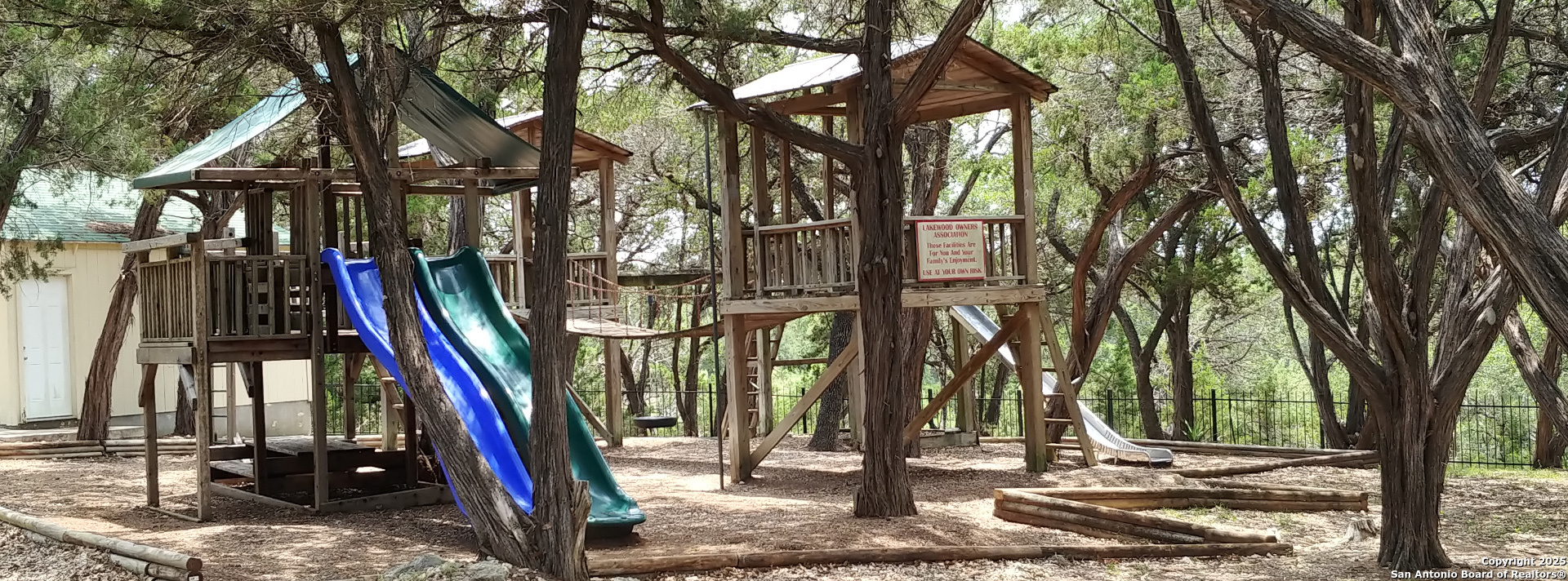175 Forest Oaks Lane Lakehills, TX 78063 - Photo 34 of 36 a view of outdoor space with lots of trees and plants